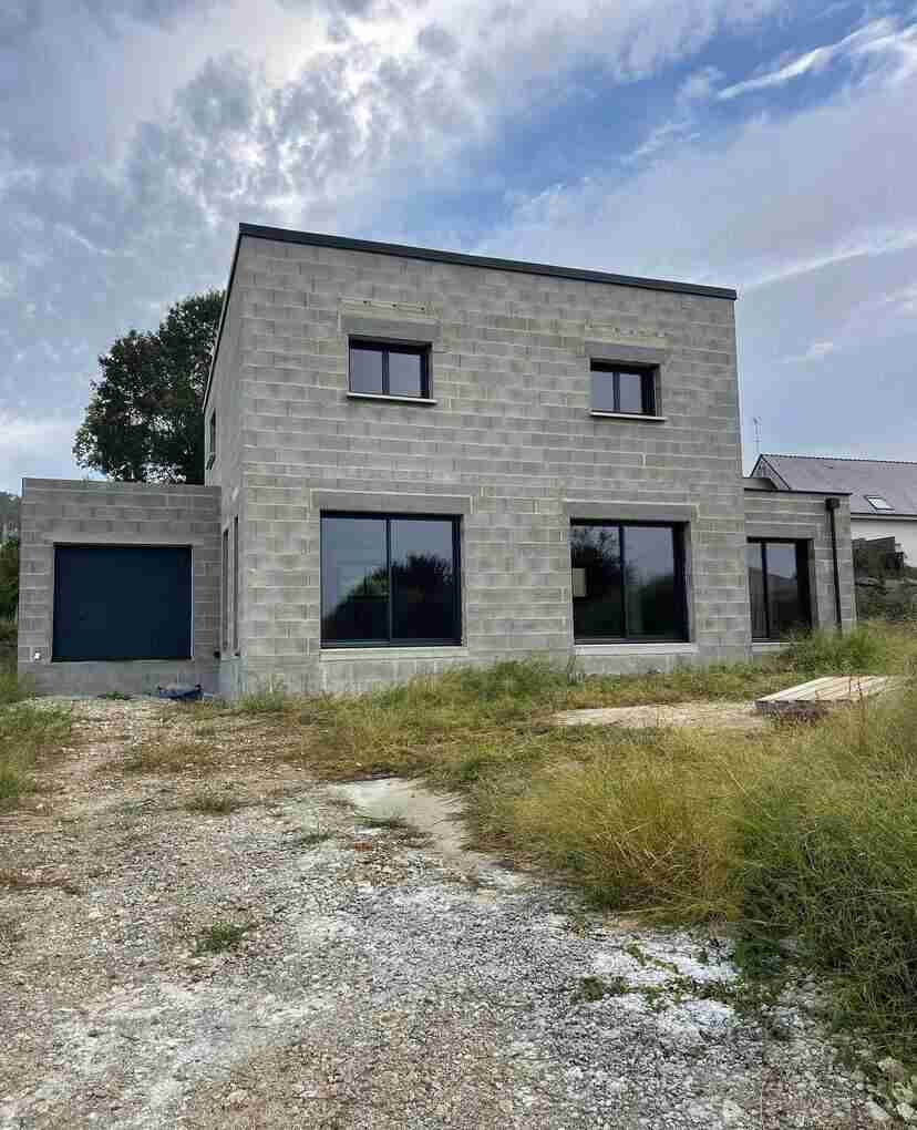 Maison moderne en parpaings - Maçonnerie contemporaine 77